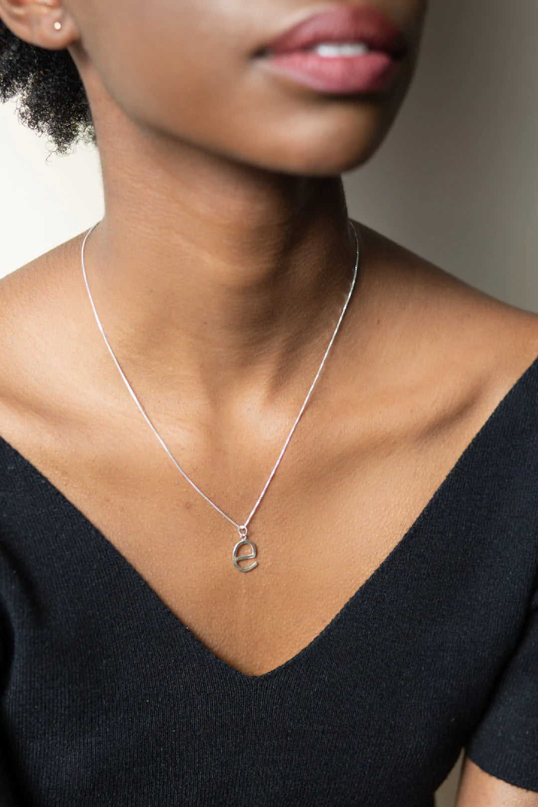 Laughing Sparrow E Letter Necklace
